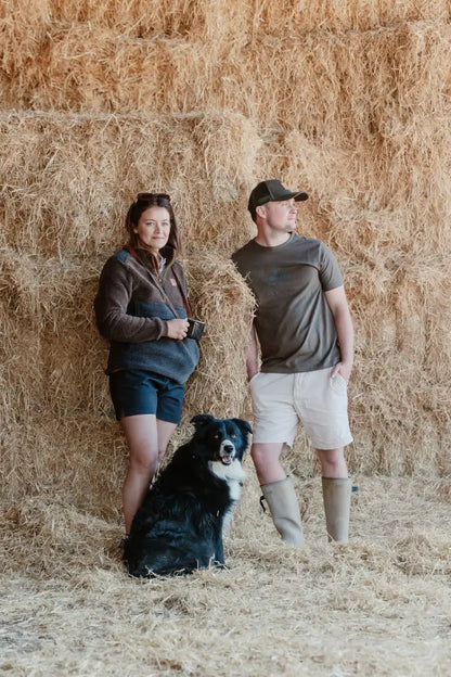 Rural couple with dog wearing New Forest Rugby Shorts, perfect country clothing for hunting