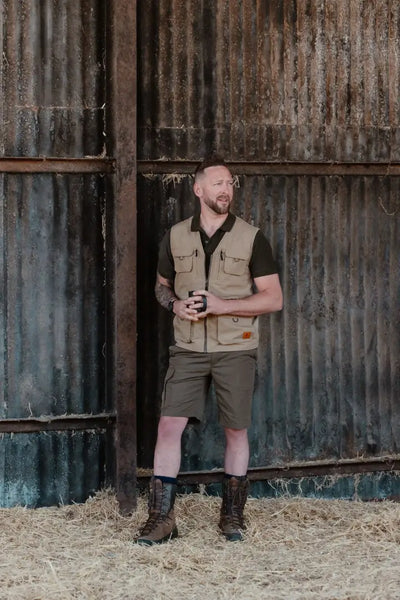 Man wearing the New Forest V-Neck Explorer Gilet in outdoor forest explorer style