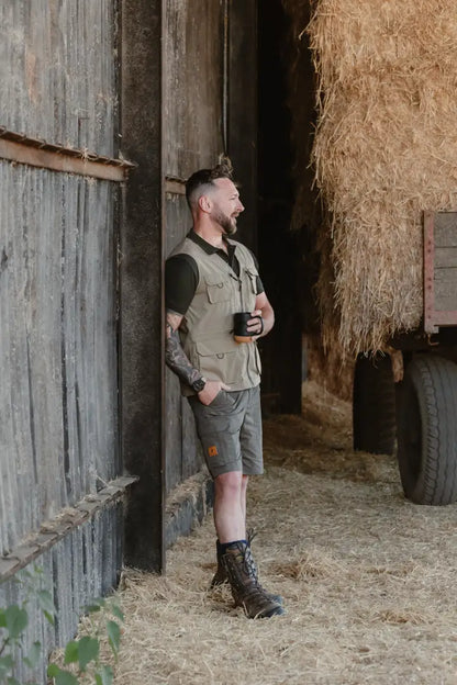Man in outdoor attire wearing the New Forest V-Neck Explorer Gilet in nature