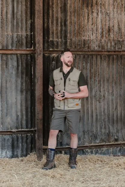 Man in outdoor attire wearing the New Forest V-Neck Explorer Gilet in nature