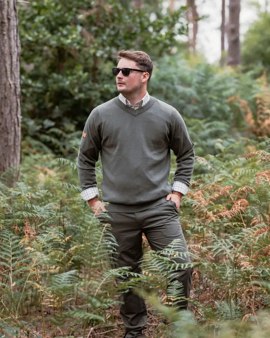 Man in matching green forest v-neck jumper and pants, perfect for cozy style