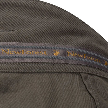 Olive-green fabric with New Forest ribbon detail on Forest Woodland Trousers with button fastening