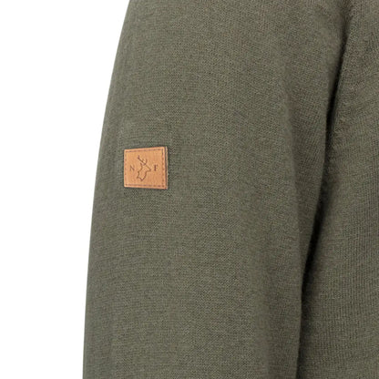 Olive green knit sweater sleeve with leather logo patch on New Forest Zip Neck Jumper