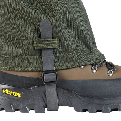 Green Percussion Rip-Stop 1200 Gaiters attached to a hiking boot for outdoor adventures