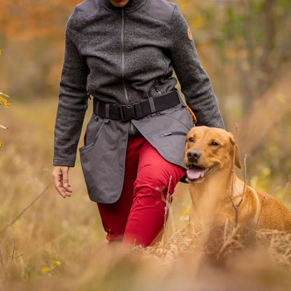 Person with dog in nature wearing Pinewood Dog Sports Waistbelt for dog sports and hunting