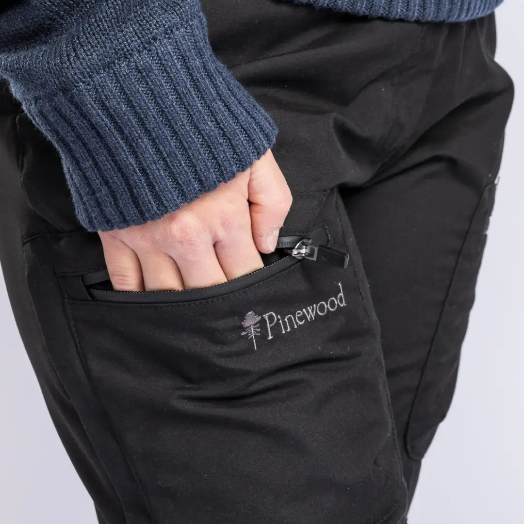Hand in pocket of Pinewood Ladies Caribou TC Trousers for a stylish look