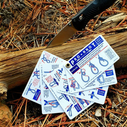 White plastic outdoor knots cards with blue diagrams showing trucker’s hitch and tautline hitch