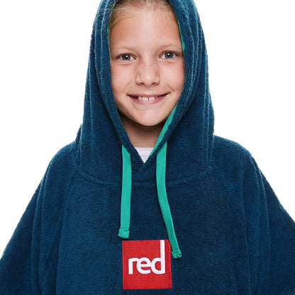 Smiling child in blue hooded sweatshirt with red logo, perfect for kids luxury towelling
