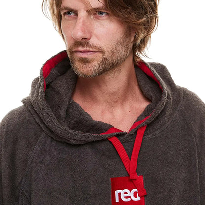 Man in gray hoodie with red tag, showcasing a stylish Towelling Change Robe