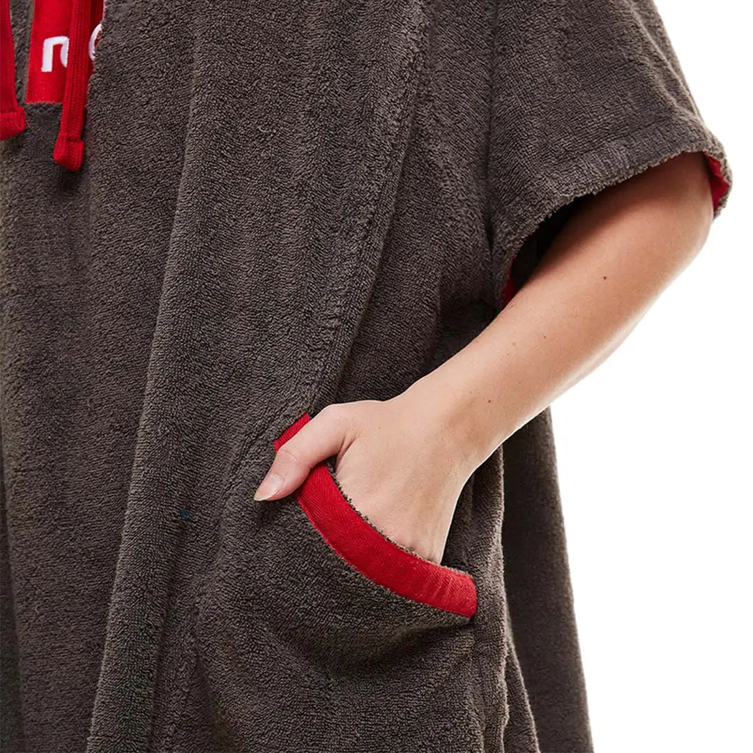 Gray towelling change robe with red trim and side pocket for easy changing convenience