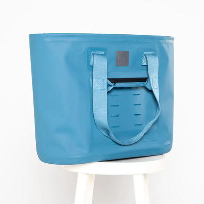 Light blue tote bag with front pocket perfect for country clothing and hunting trips
