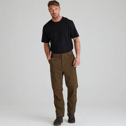 Man in black t-shirt and olive green Ridgeline Cambrian Trousers for extreme weather