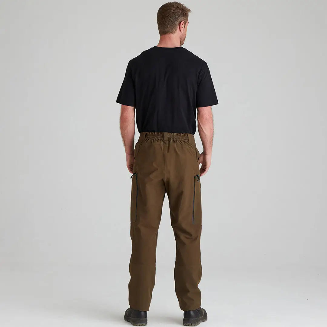 Man in Ridgeline Cambrian Trousers and black t-shirt, perfect for extreme weather