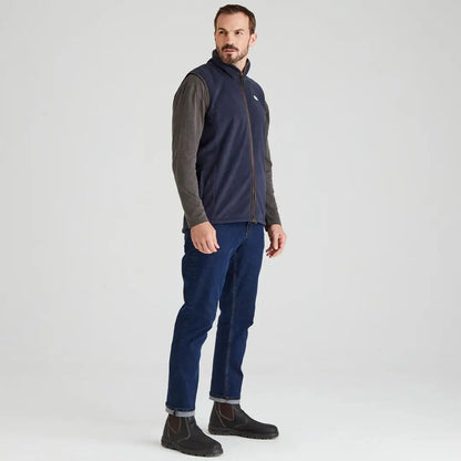 Man in navy vest and jeans showing Ridgeline Kodiak Gilet style for casual outdoor look