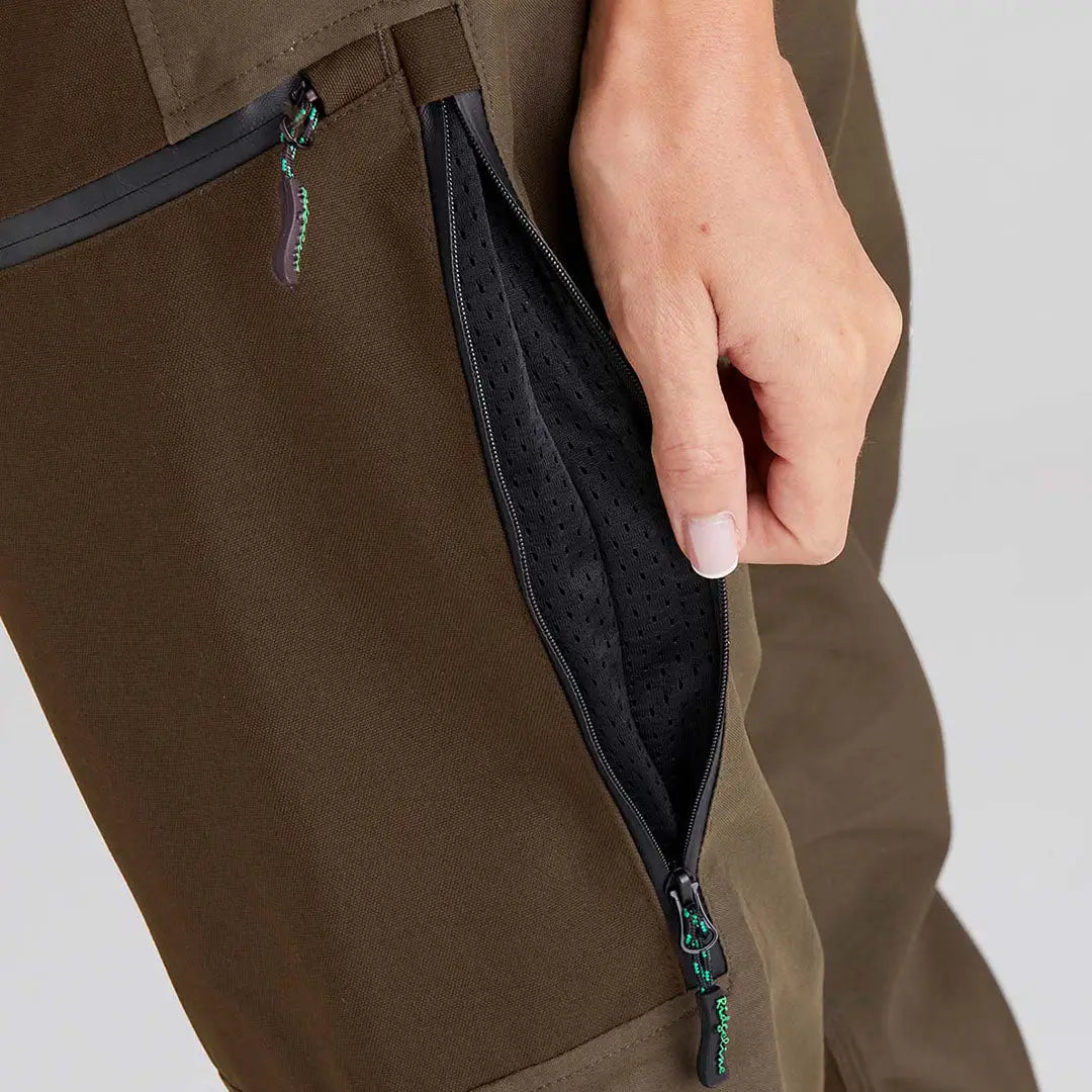Olive green Ridgeline Ladies Cambrian Trousers with zippered mesh pocket for harsh weather