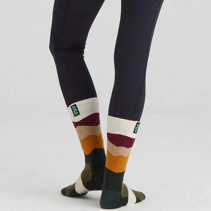 Black leggings with stylish patterned merino wool socks for comfy, breathable wear