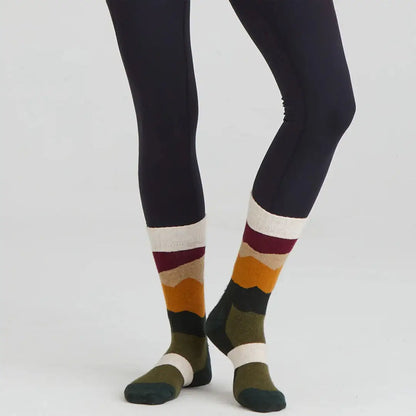 Black leggings with colorful patterned merino wool socks for cozy style