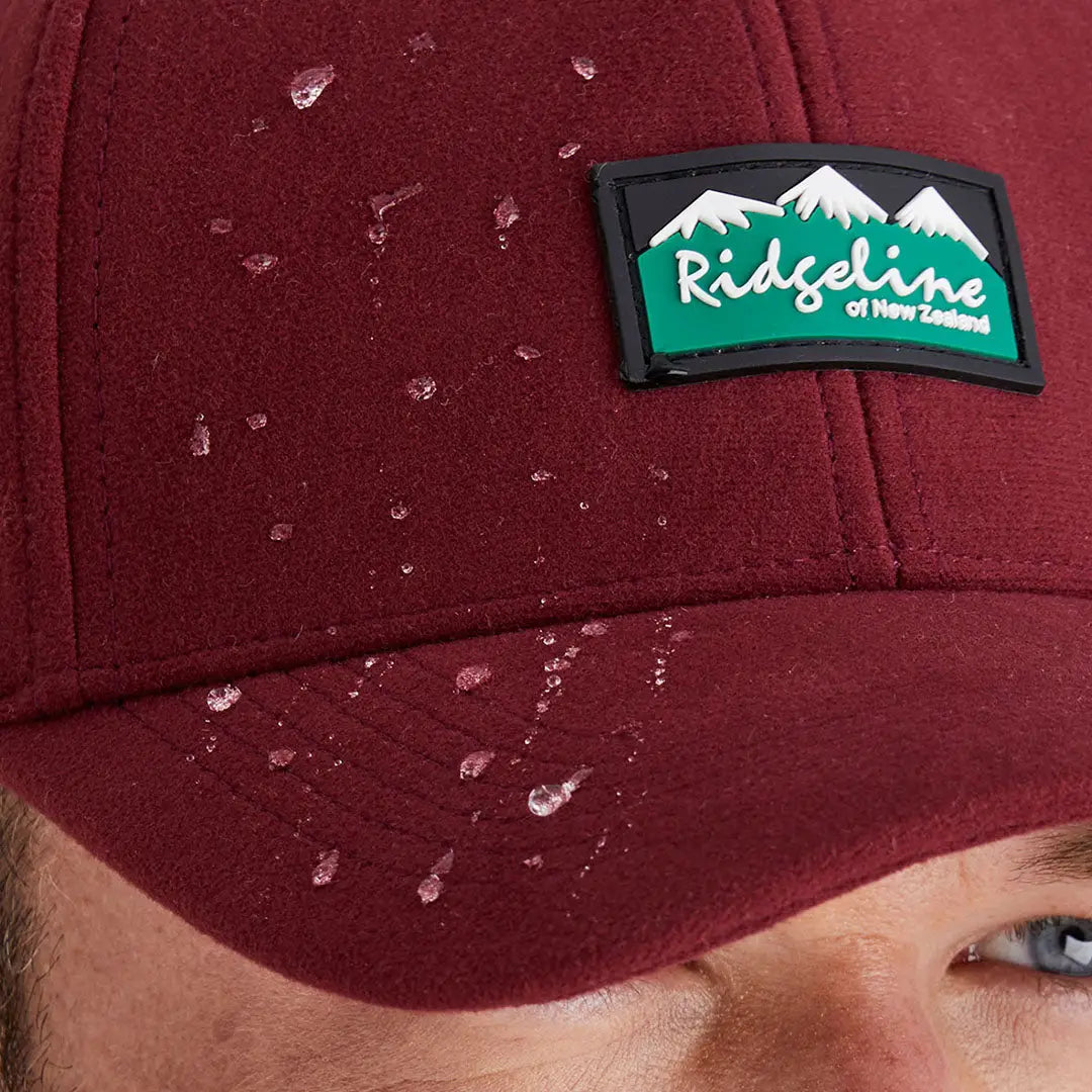 Maroon Monsoon Classic Cap with waterproof surface perfect for outdoor adventures