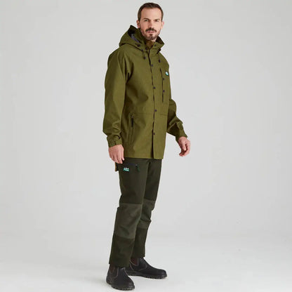 Man in green outdoor clothing wearing Ridgeline Monsoon Light Jacket during Elements Stop hike