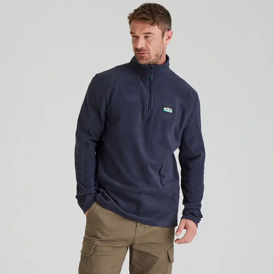 Man wearing Ridgeline Narvik Fleece in highly functional navy polyester fleece