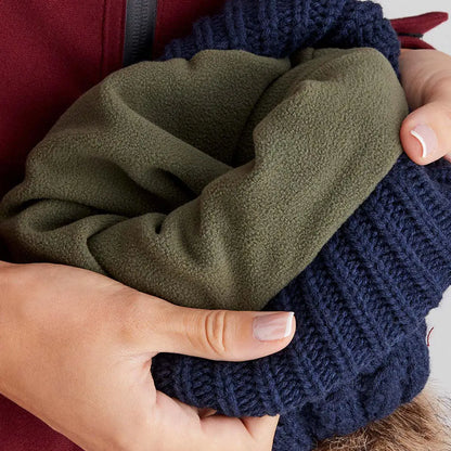 Navy blue Nordic Fleck Bobble Hat with olive green fleece lining for winter warmth
