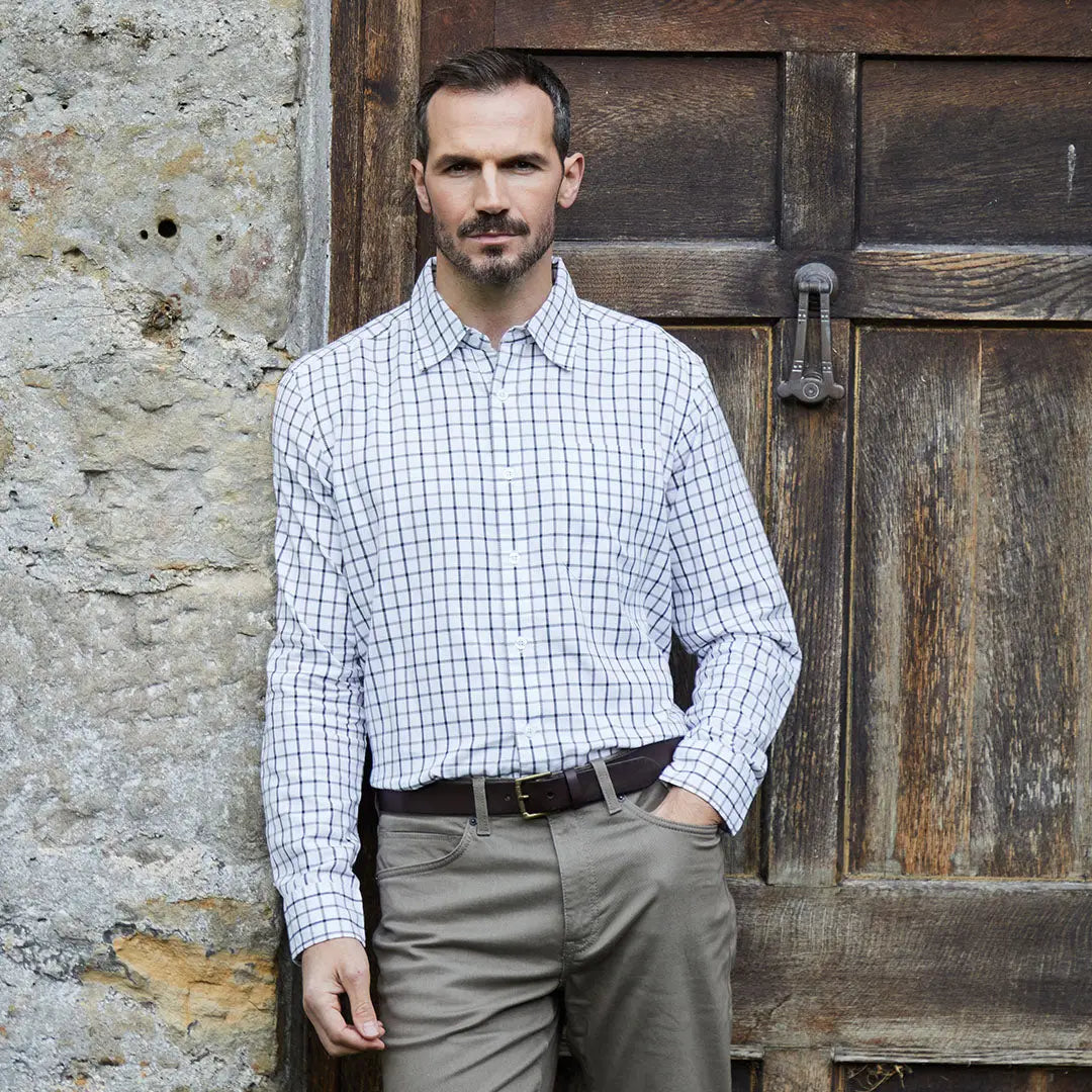 Man in checkered shirt wearing a Ridgeline Sedgebrook Shirt for a stylish look
