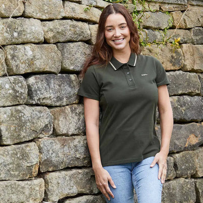 Woman in green Ridgeline Womens Kilworth Polo Shirt showing stylish kilworth polo shirt