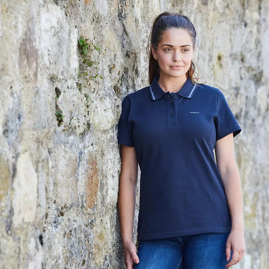 Woman wearing navy Kilworth Polo Shirt from Ridgeline Womens Kilworth Polo collection