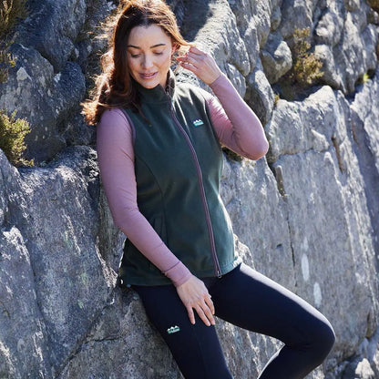 Woman wearing Ridgeline Womens Kodiak Gilet in green, perfect for superior southern outdoor adventures