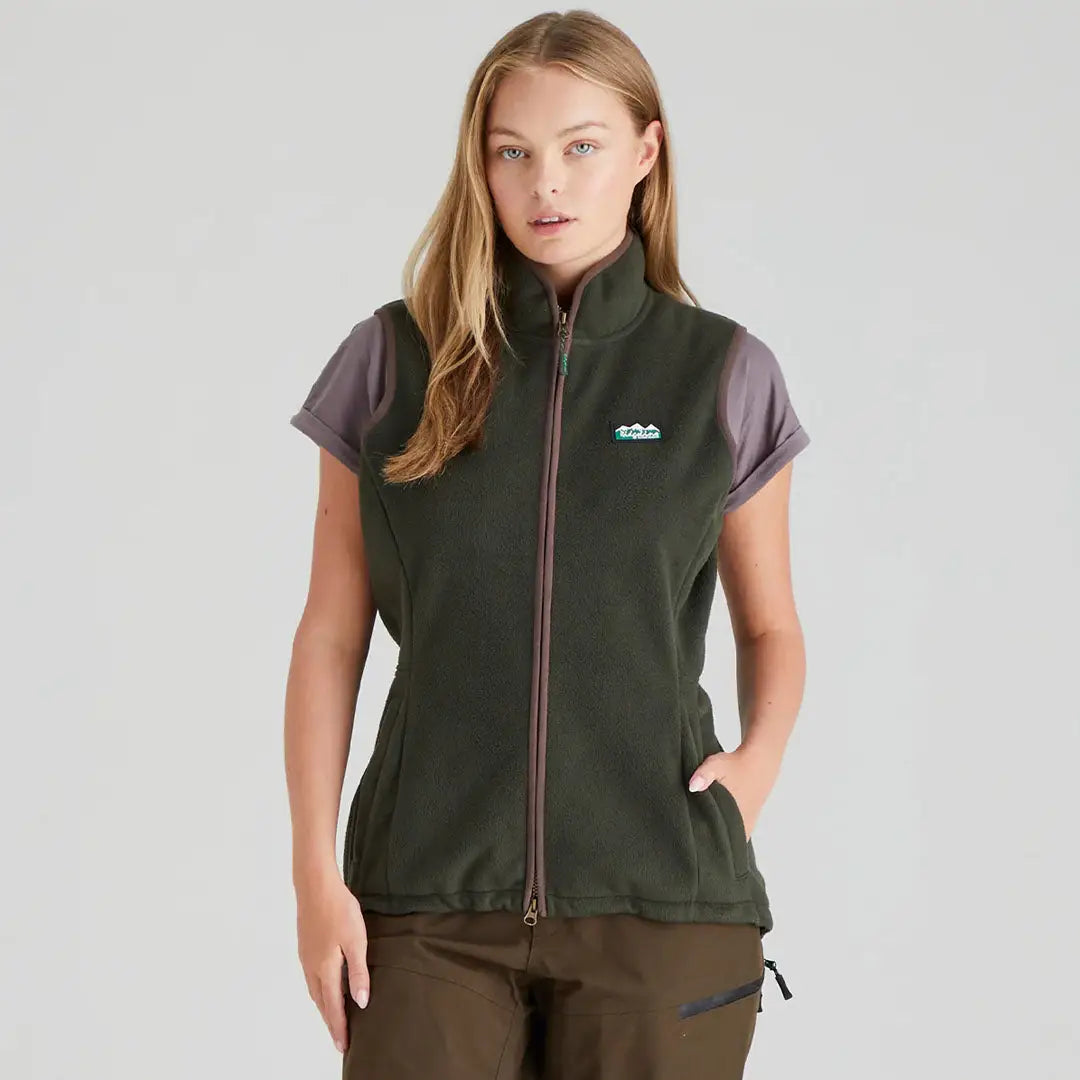 Woman wearing Ridgeline Womens Kodiak Gilet in olive green fleece vest, perfect for outdoor adventures