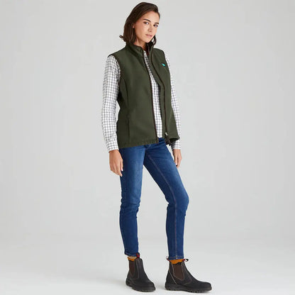 Woman wearing a green Ridgeline Women’s Monarch Gilet for outdoor adventures