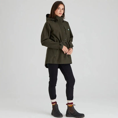 Woman wearing a green hooded Ridgeline Womens Monsoon Classic Smock in Deep Forest