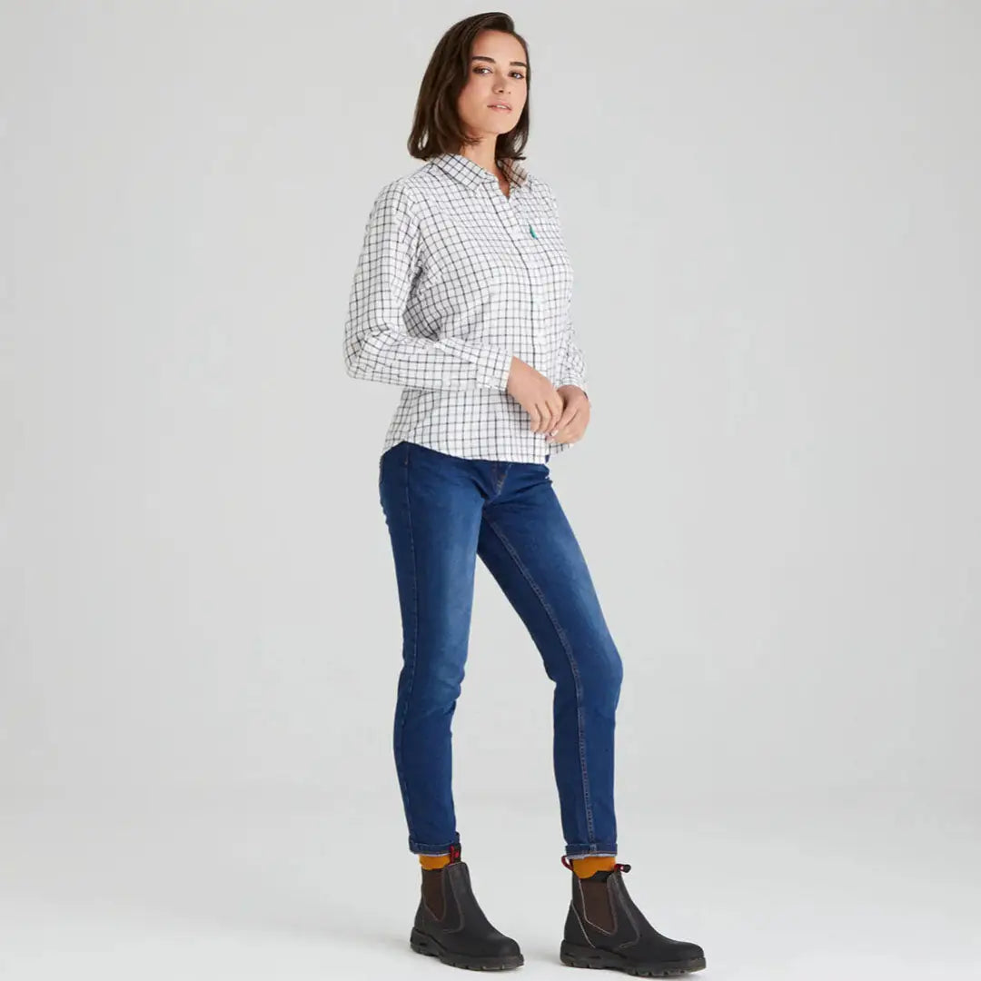 Ridgeline Womens Sedgebrook shirt worn by woman in checkered long-sleeve top and jeans