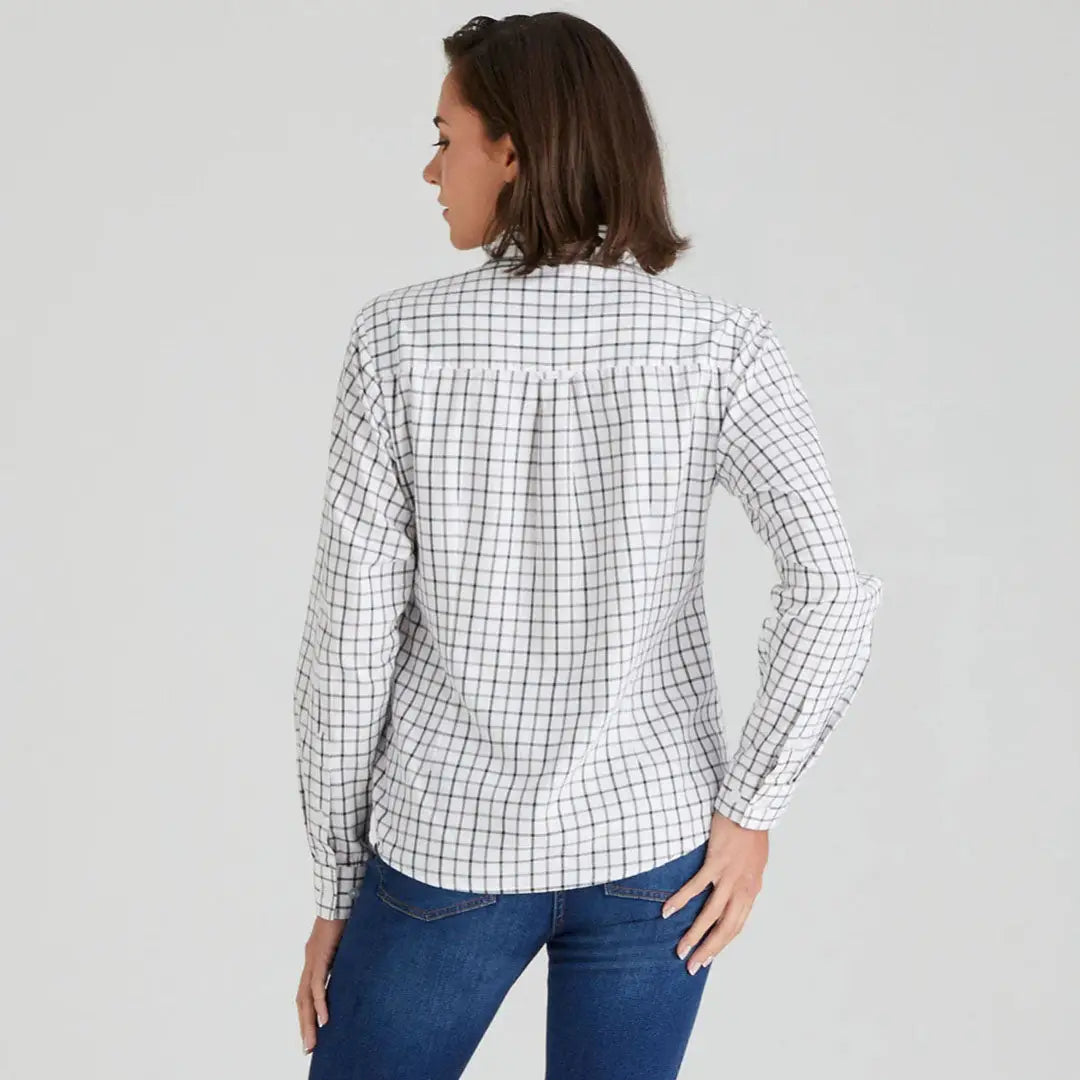 Woman wearing Ridgeline Womens Sedgebrook Shirt in checkered pattern from Ridgeline Womens