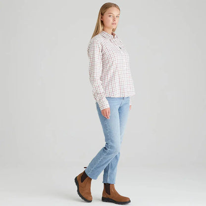 Woman wearing Ridgeline Womens Sedgebrook Shirt in plaid and jeans casual look