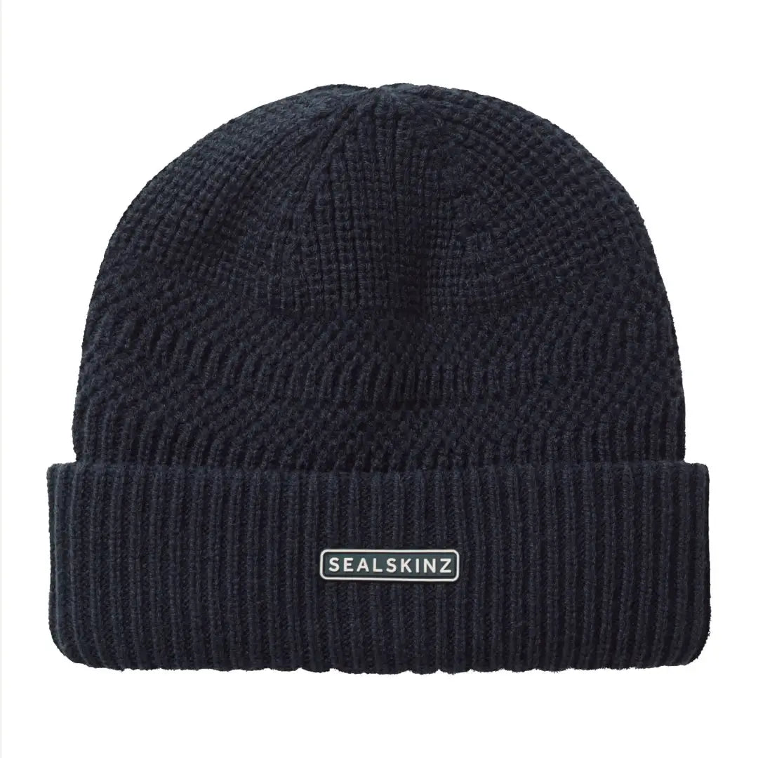 Dark navy blue roll cuff beanie with textured knit and ribbed cuff for cold weather