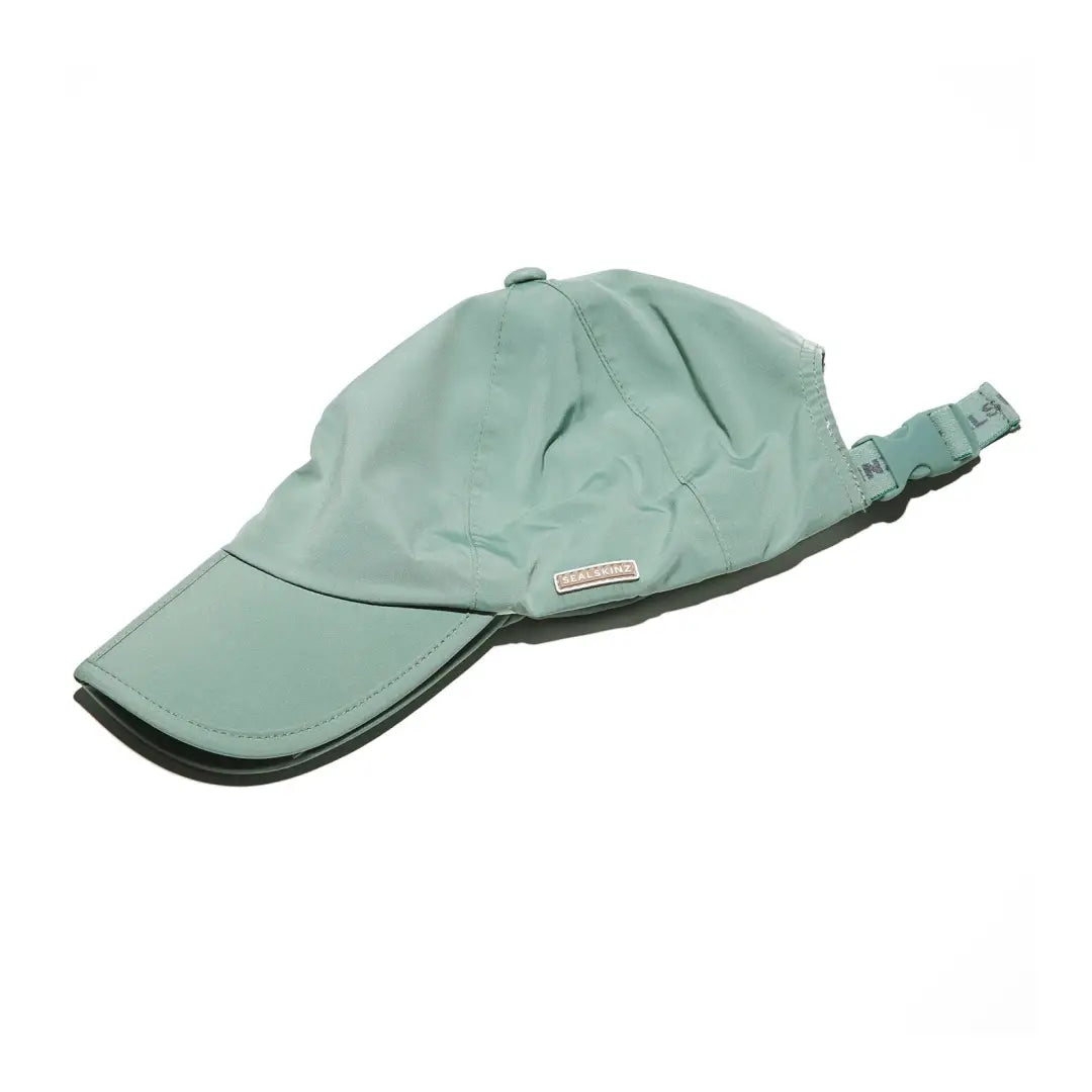 Stylish mint green Sealskinz Salle Cap with adjustable strap for a perfect fit
