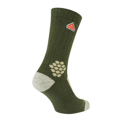 Green hiking sock made from recycled wool with a hexagonal grip pattern on the heel