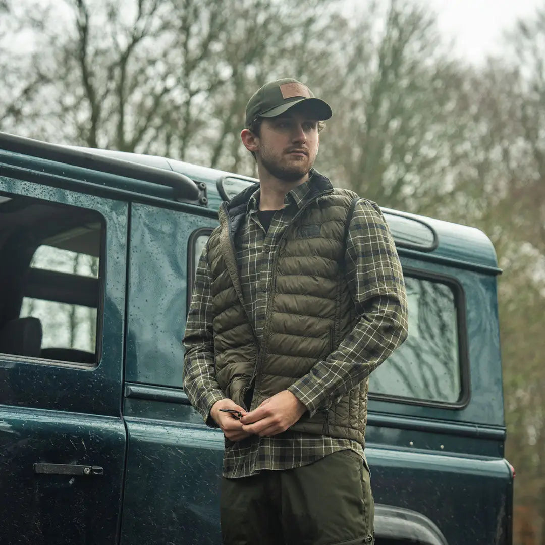 Man in outdoor attire wearing Seeland Fahrenheit Waistcoat for hunting and country clothing