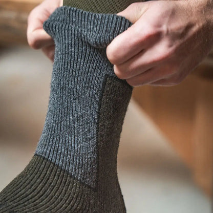 Rolled-down gray and green Seeland Field Thermo Socks in 2Pack, great for outdoor use