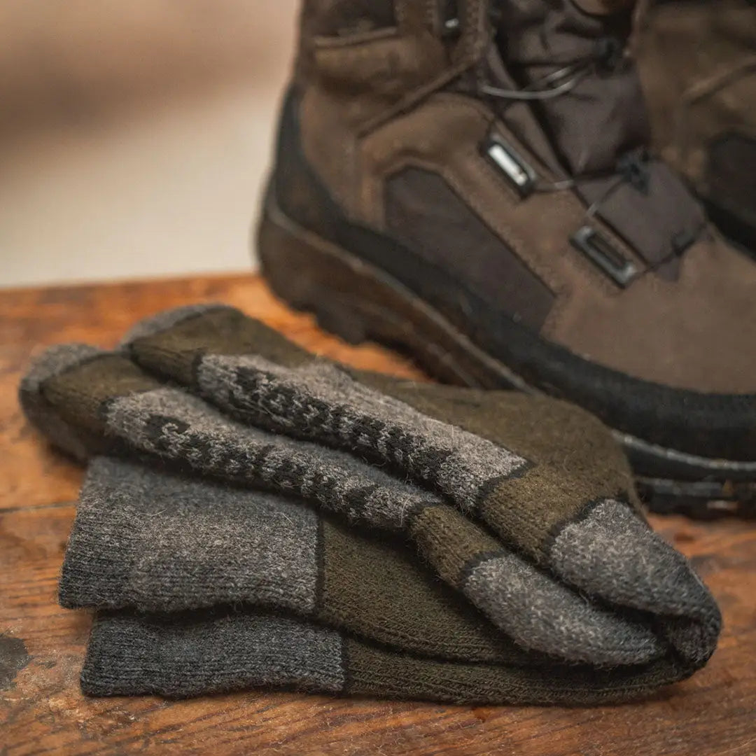 Folded Seeland Field Thermo Socks in gray and green for ultimate warmth and comfort