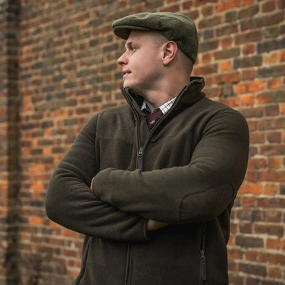 Man in green Seeland Fog Fleece Jacket, great for country clothing and hunting adventures