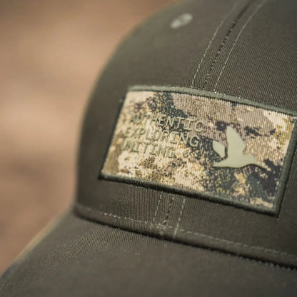 Olive green Seeland Ganister Trucker Cap with a cool camouflage patch