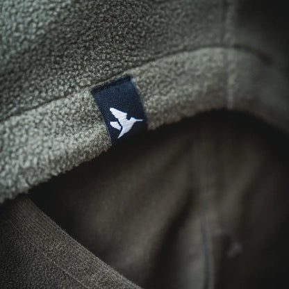 Green fleece shirt with logo tag, perfect for outdoor adventures in the Gust Fleece style