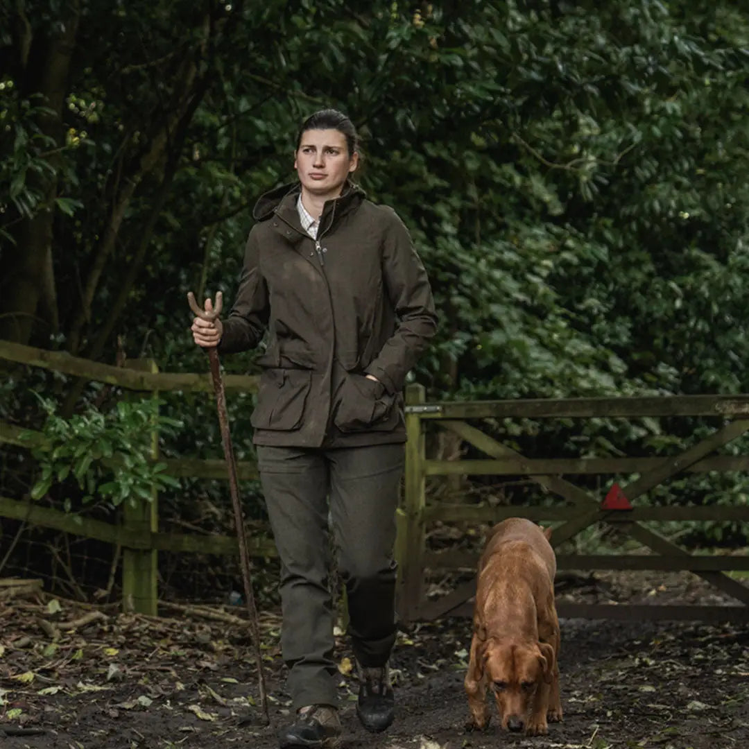 Woman in outdoor country clothing with dog wearing Seeland Highpoint Womens Harriet Jacket for hunting