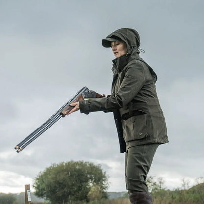 Woman holding a shotgun in Seeland Highpoint Womens Harriet Jacket for hunting and country clothing
