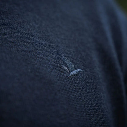 Navy blue knit fabric with bird logo on Seeland Pine V-Neck Pullover for country hunting clothing