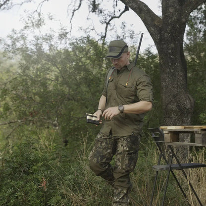 Hunter wearing a Seeland Selous Cap with ammunition, perfect for country clothing and hunting