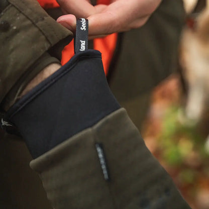 Green and black jacket sleeve from Seeland Target Gloves, great for country hunting gear