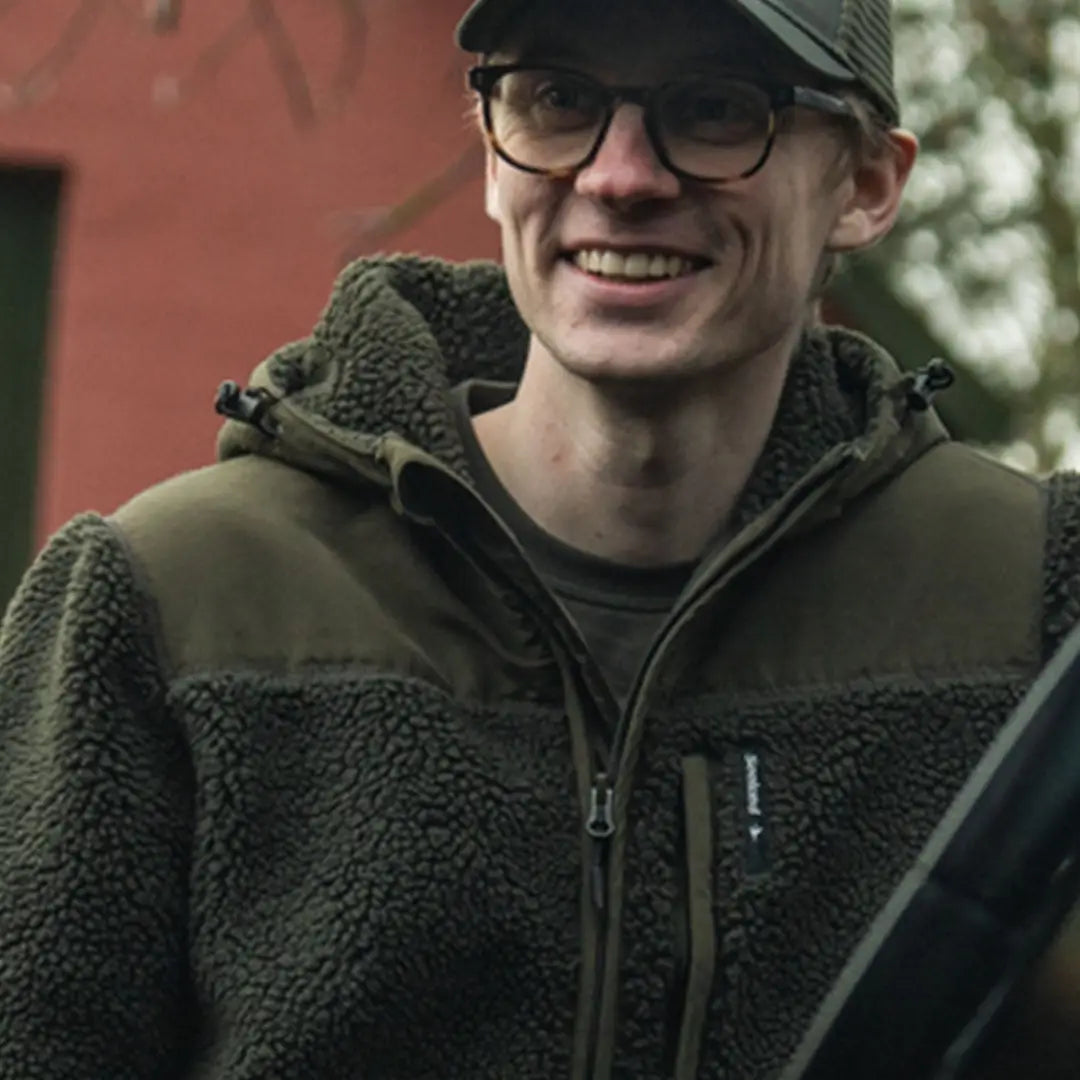 Smiling man in Seeland Thaw Fleece Jacket wearing a cozy Thaw Fleece Jacket outdoors